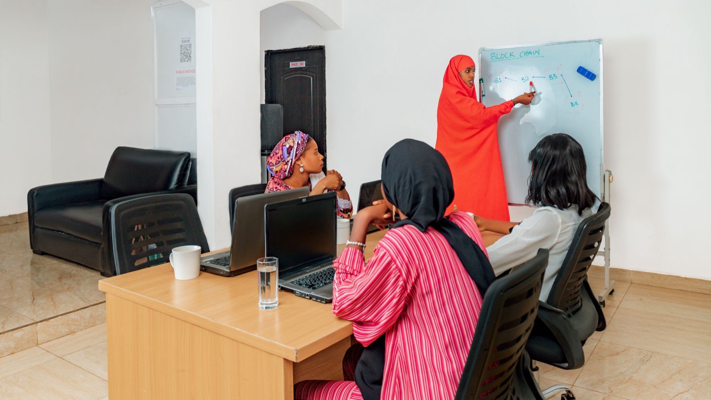 Women learning together in a classroom